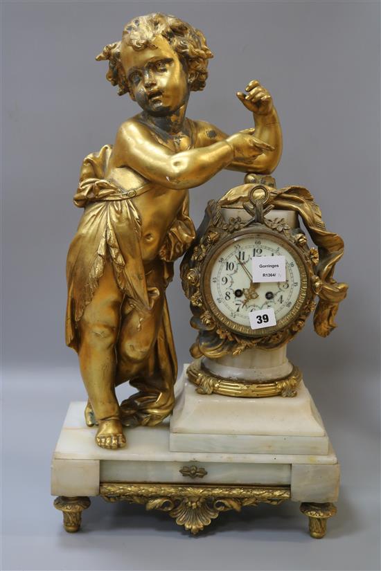 A Louis XV style gilt spelter and marble 8 day mantel clock